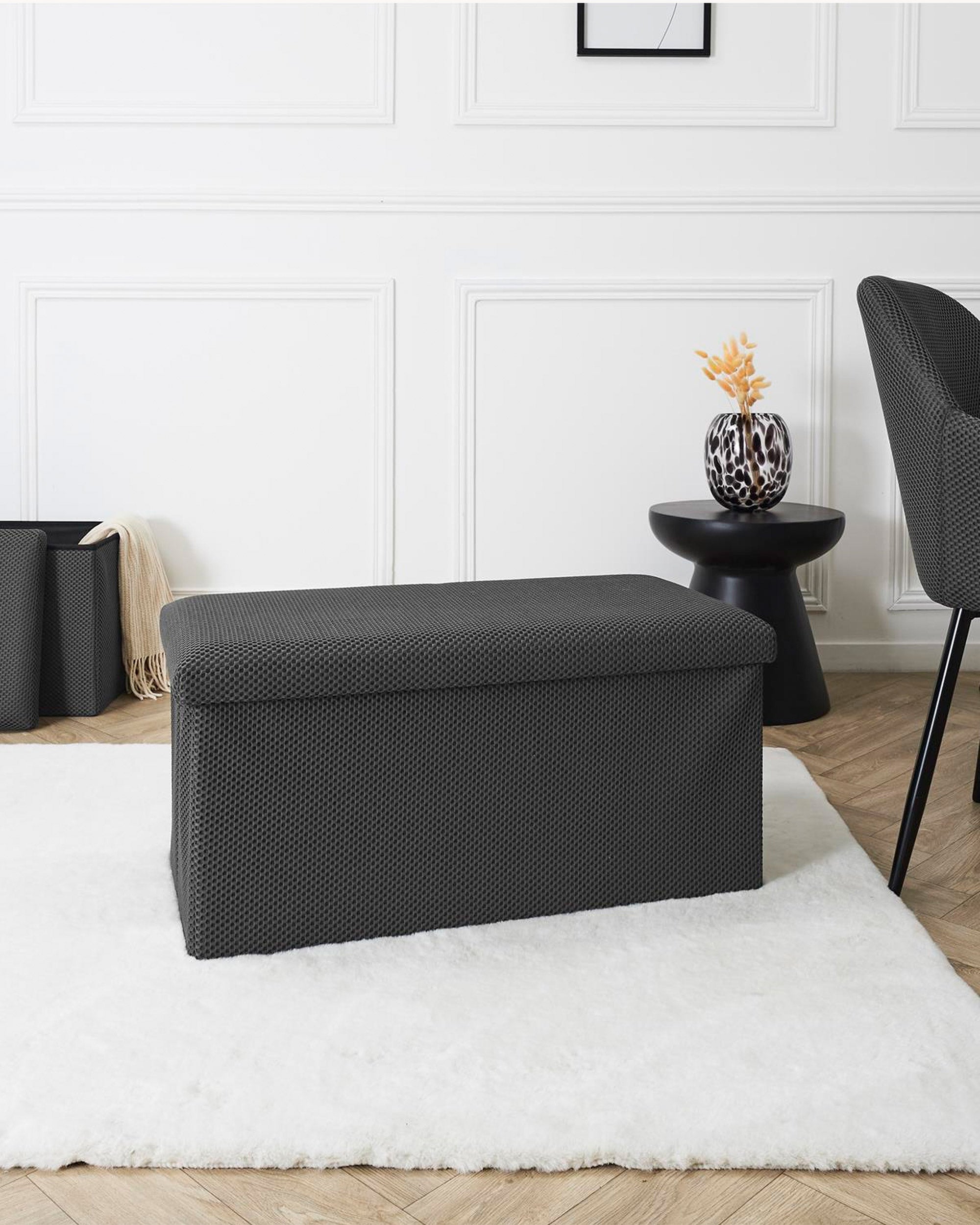 Taburete plegable ATOM con almacenaje